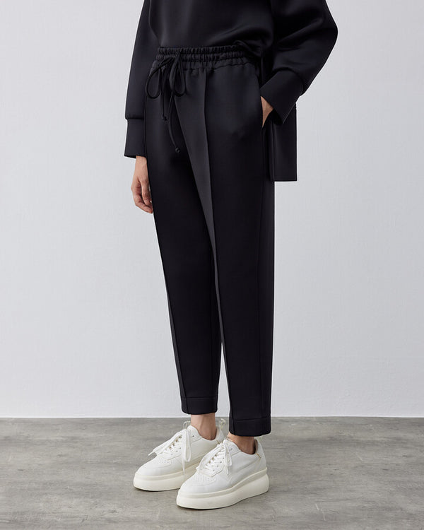 Puff Elastic Pocket Carrot Cut Pants in Black